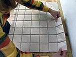 page 3 laying a ceramic floor tile